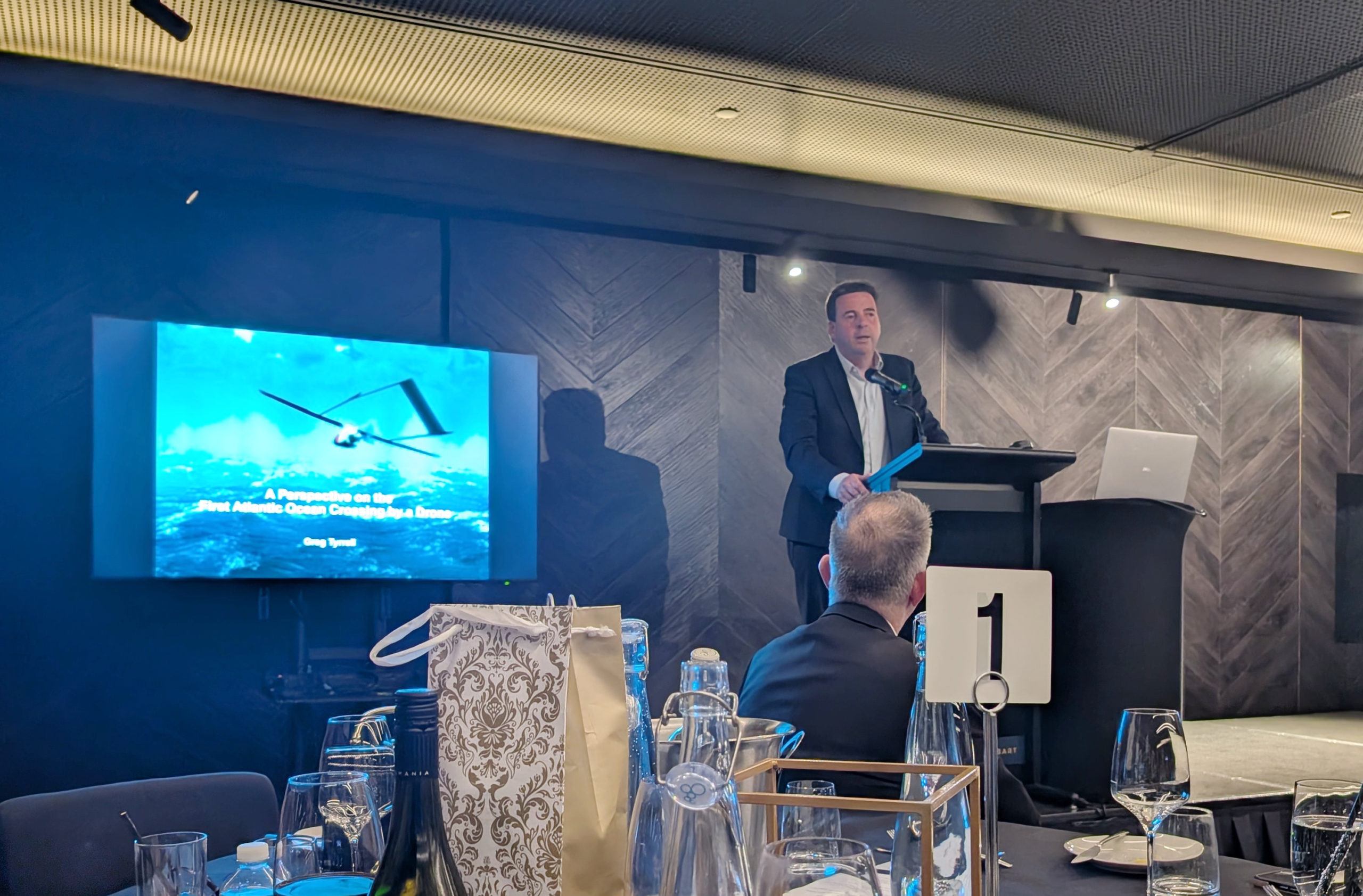 Keynote speaker Greg Tyrrell presents a talk on the first Atlantic crossing by a drone